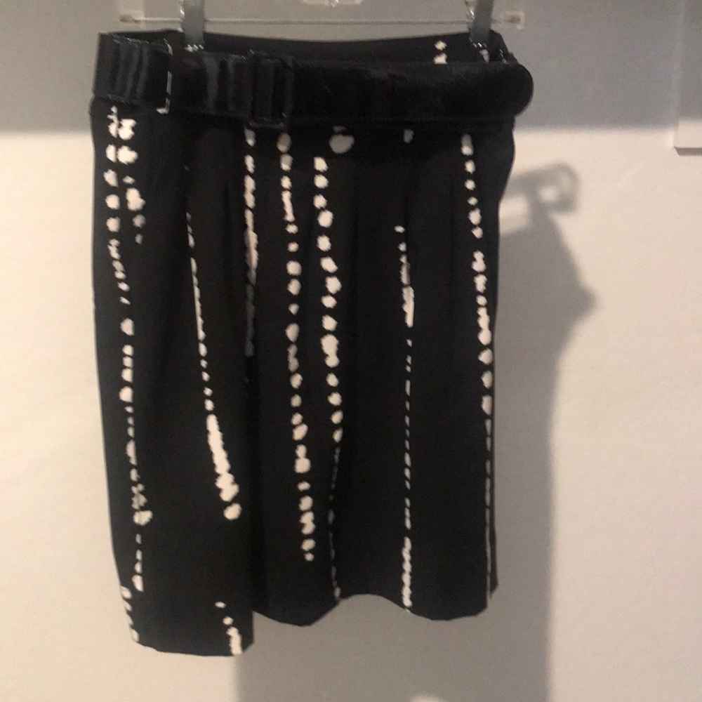 Black/white, pleated above the knee skirt